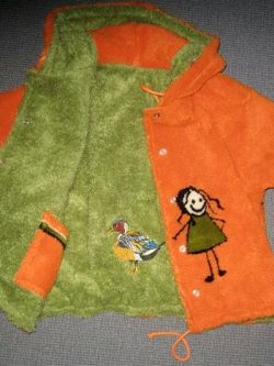 Wendejacke Orange innen Grün mit Figuren