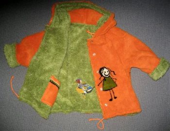 Wendejacke Orange innen Grün mit Figuren